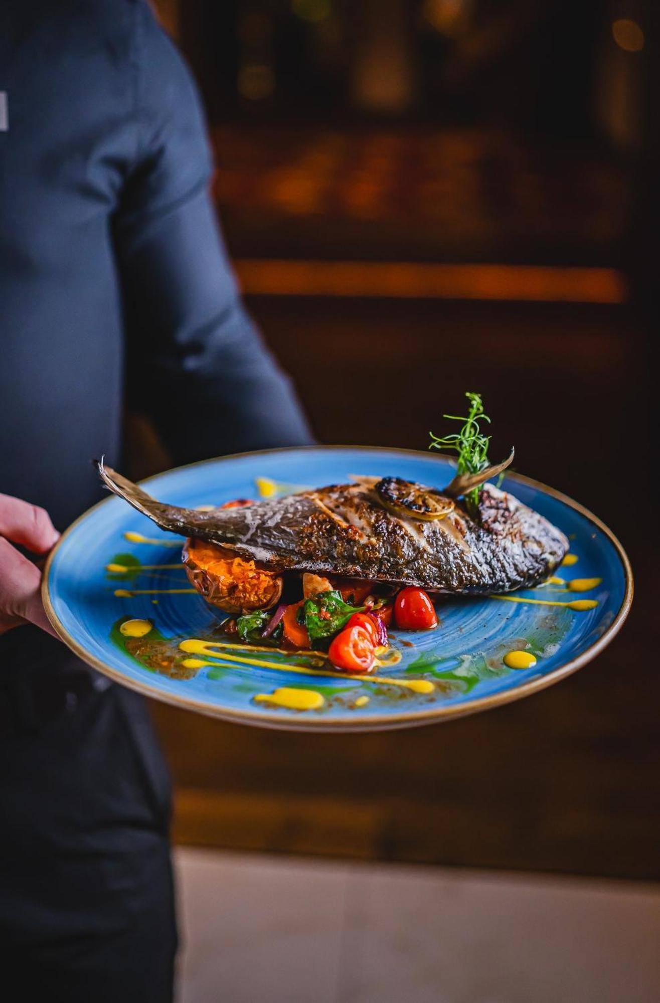 Hotel Bristol Tradition And Luxury Rzeszów Eksteriør billede A prepared fish